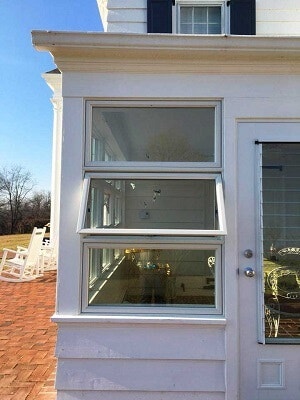 old stacked awning windows on sunroom