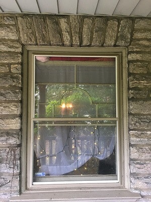 before image of philadelphia house with new wood double hung windows