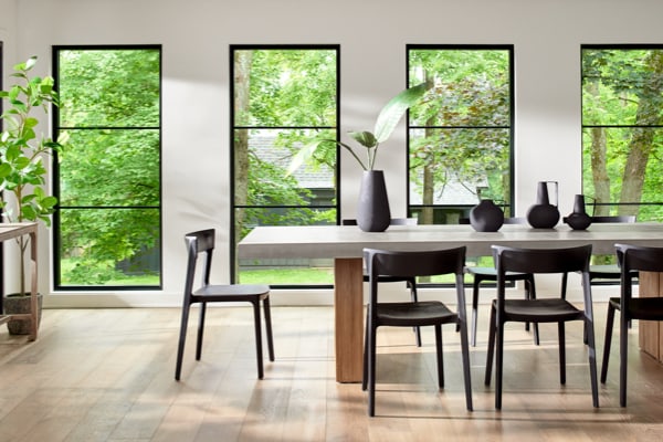windows with dark trim bring the moody design trend to life