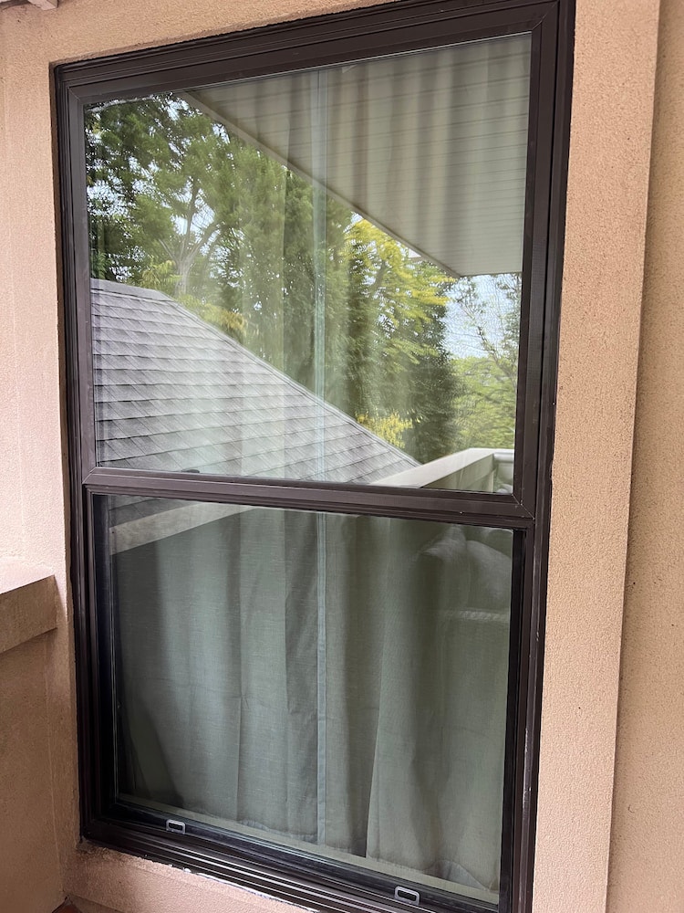 Brown fiberglass single-hung window