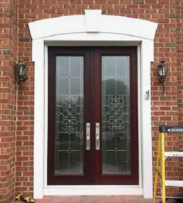 double entry door with full decorative glass panels