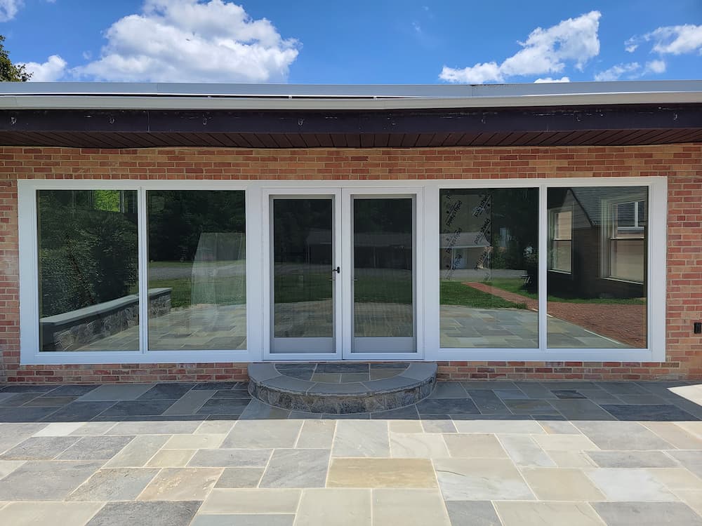 Richmond patio exterior featuring new hinged (French) doors