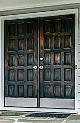 Wood paneled double entry doors