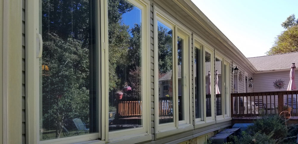 White vinyl sliding patio doors on exterior of Chester, VA, home