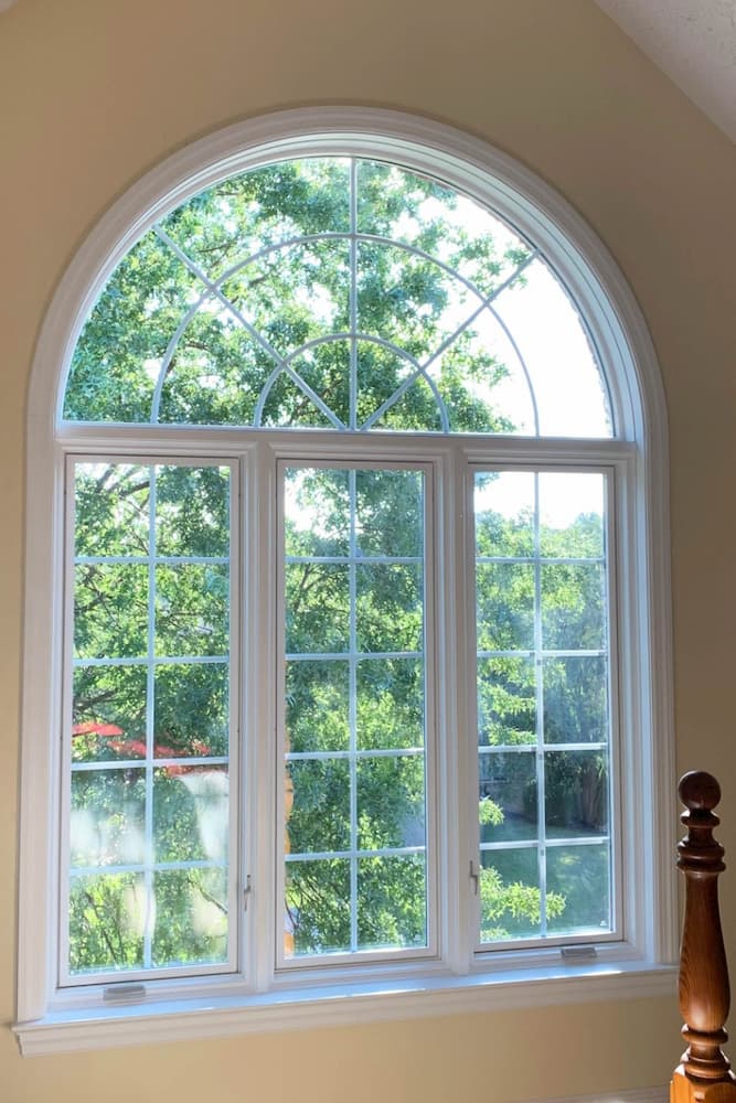 Interior view of wood casement windows with half-circle transom