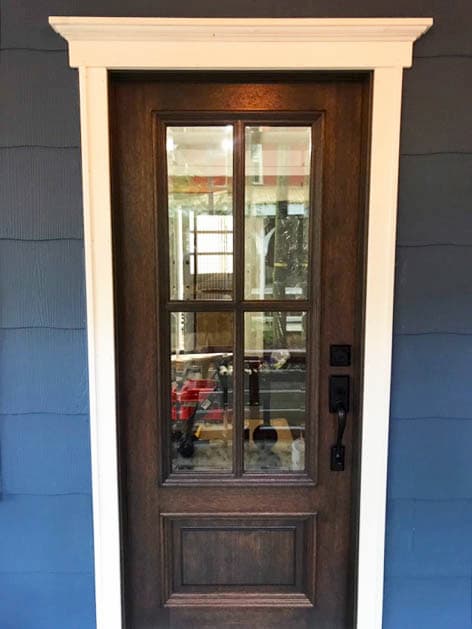 New 3/4 light wood entry door with matte black hardware