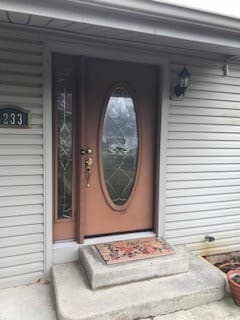 Old entry door with sidelight