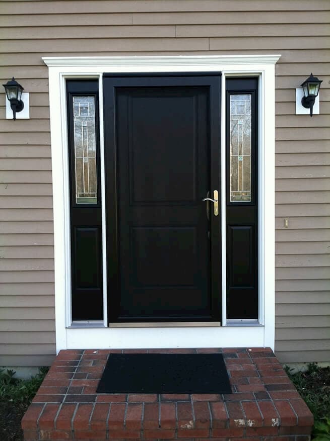 Black entry door system with storm door and sidelights