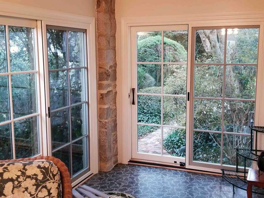 Interior of corner with wood sliding patio doors on Richmond, VA, home