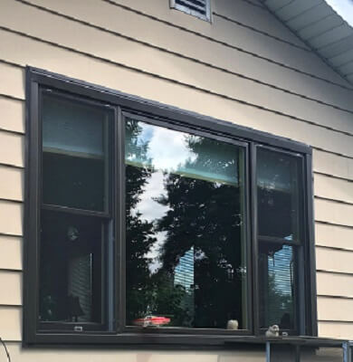after image of burlington home with new wood casement and double hung windows