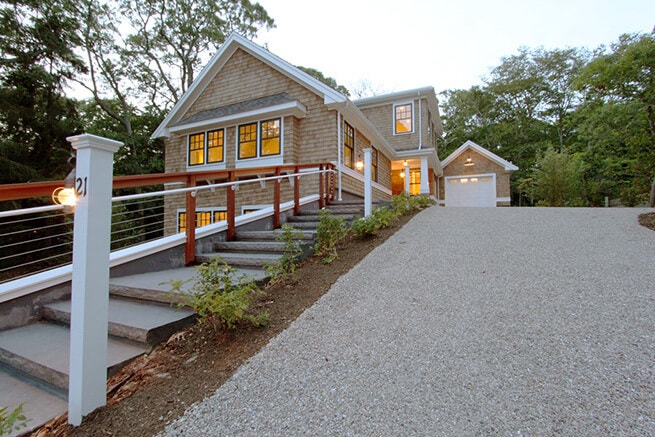 Driveway view of Woods Hole shingle-style home with Architect Series windows