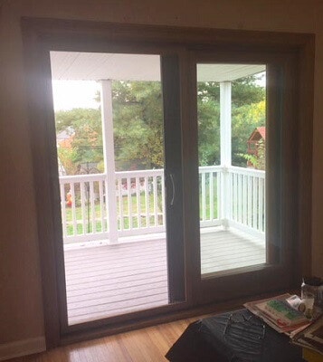 after inside image of Abington home with new sliding patio door