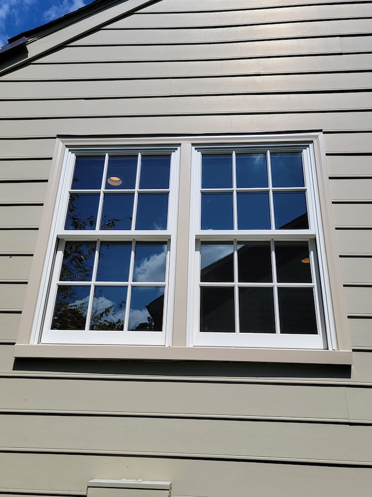 Exterior shot of Henrico home's new double-hung windows