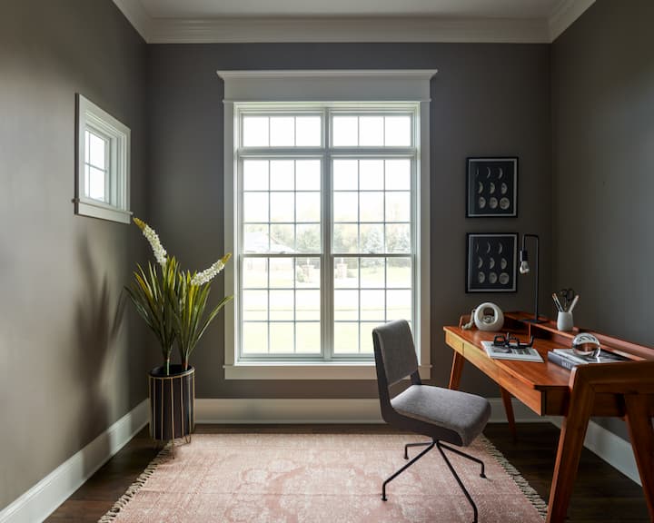 Home office with white double-hung window