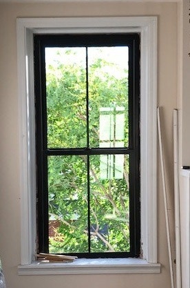 fiberglass double-hung window on historic building