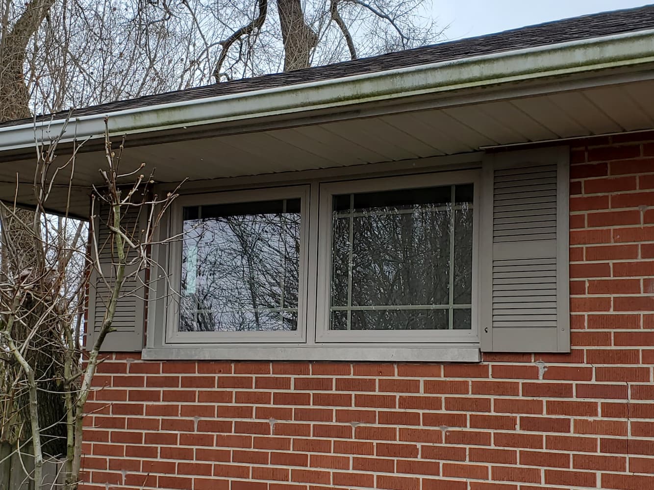 After exterior shot of new Pella windows on side of Kettering home
