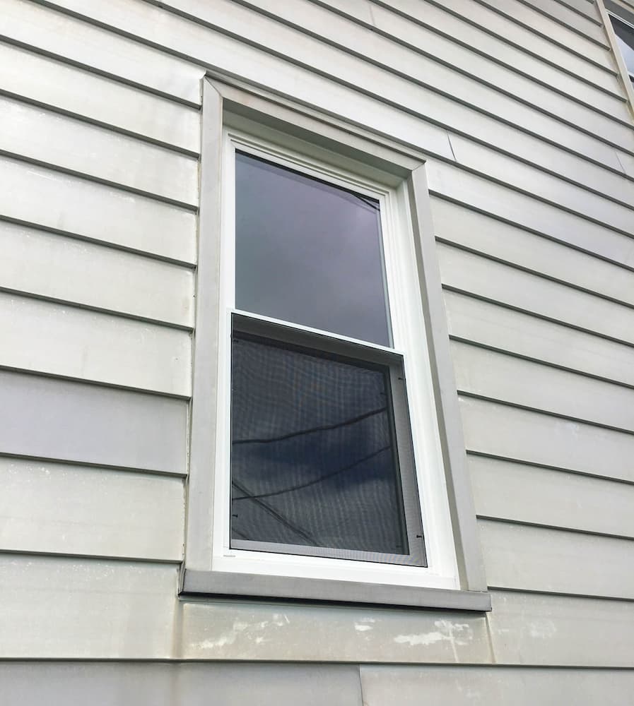 One double-hung vinyl window 