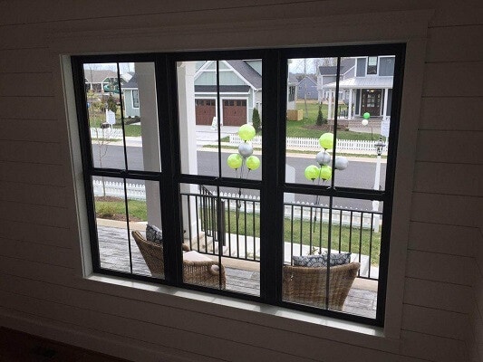 new construction home in richmond virginia gets new black fiberglass double hung windows