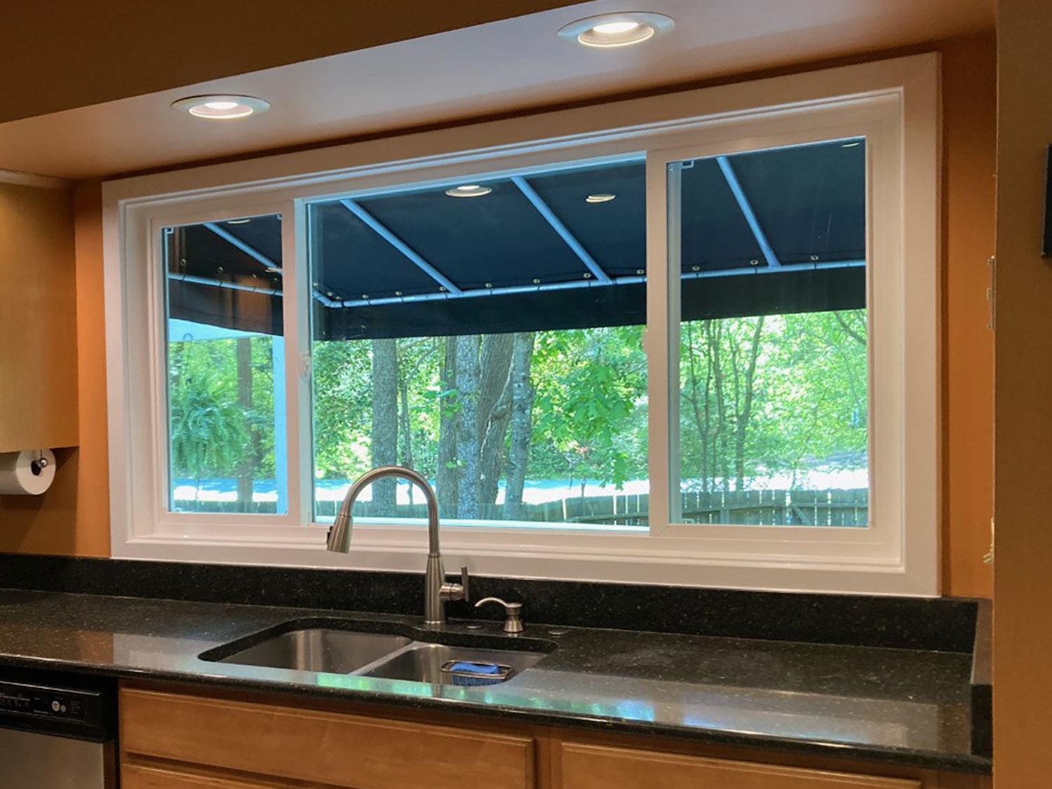 Three-paneled sliding window in Henrico kitchen