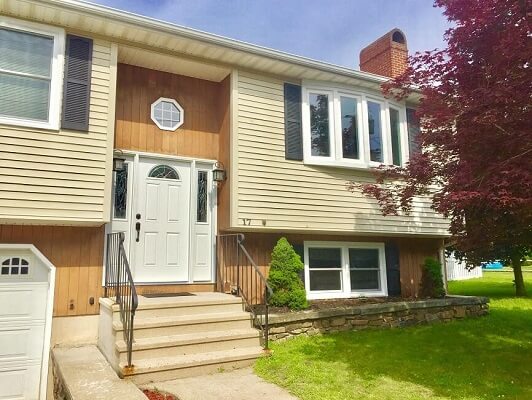 front image of naugatuck home with new vinyl double hung windows
