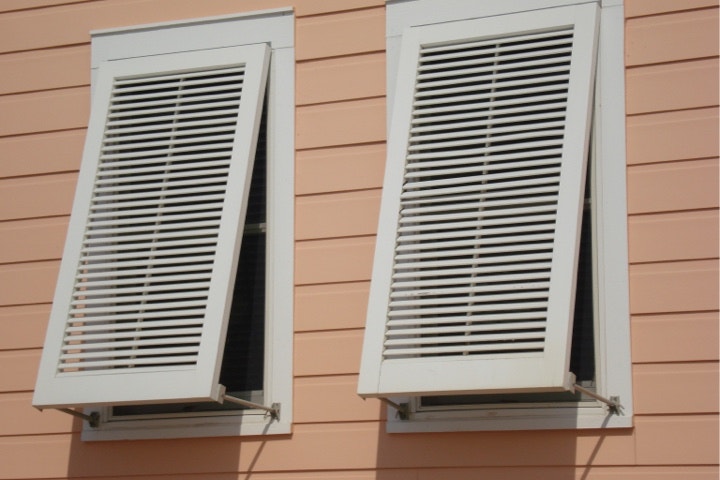 exterior windows with storm shutters 