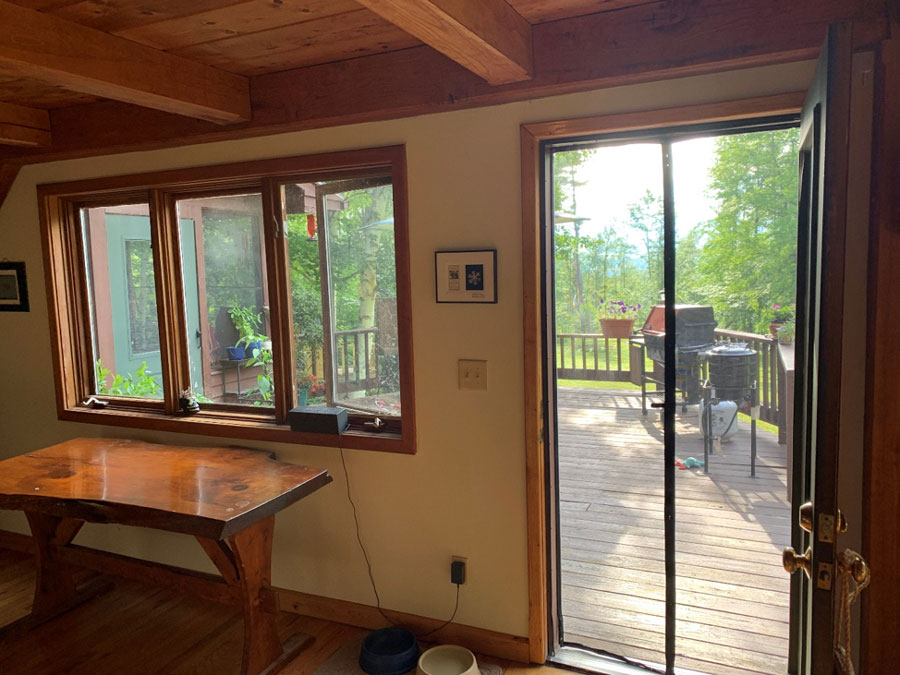Interior of Vermont home before installation of new Pella 3-panel sliding patio door