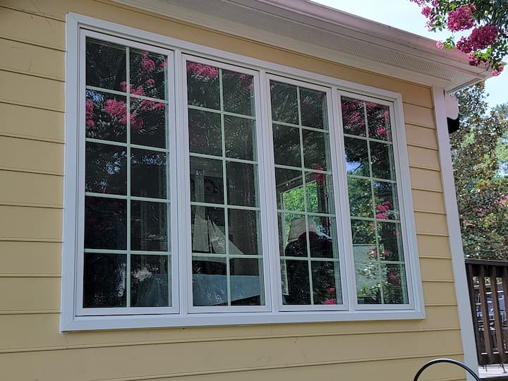 Exterior view of Henrico home with four-wide casement windows