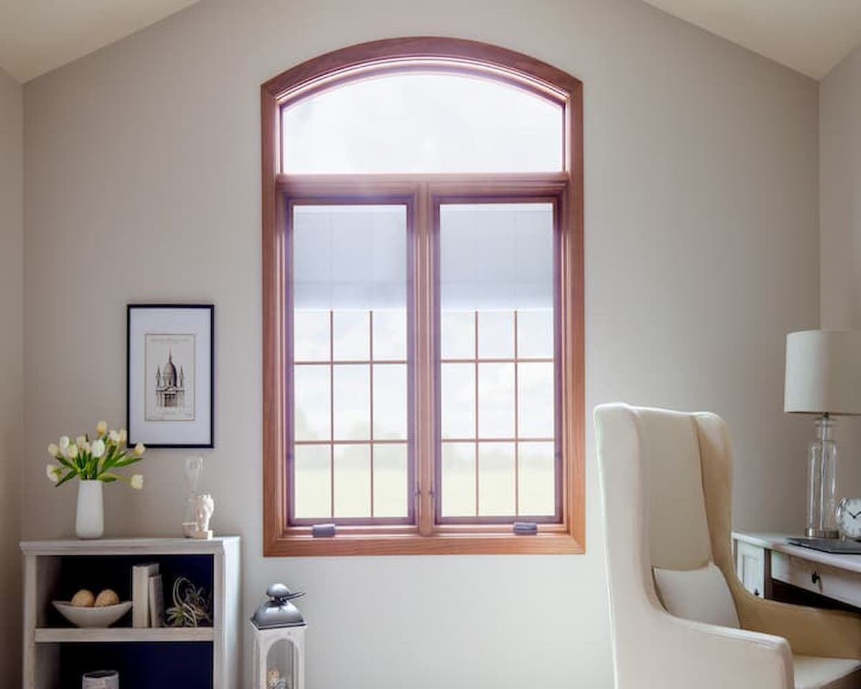 Natural stain wood window with blinds between the glass in office