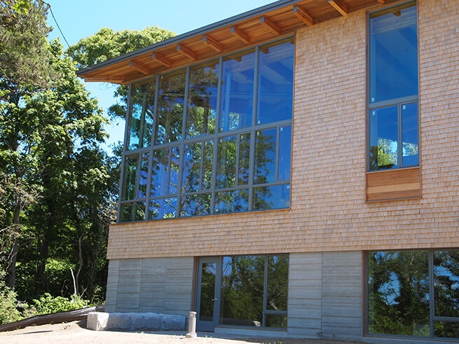 Wall of Architect Series Contemporary windows on modern Eastham Public Libary addition