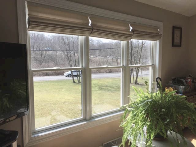Interior view of three old double-hung windows