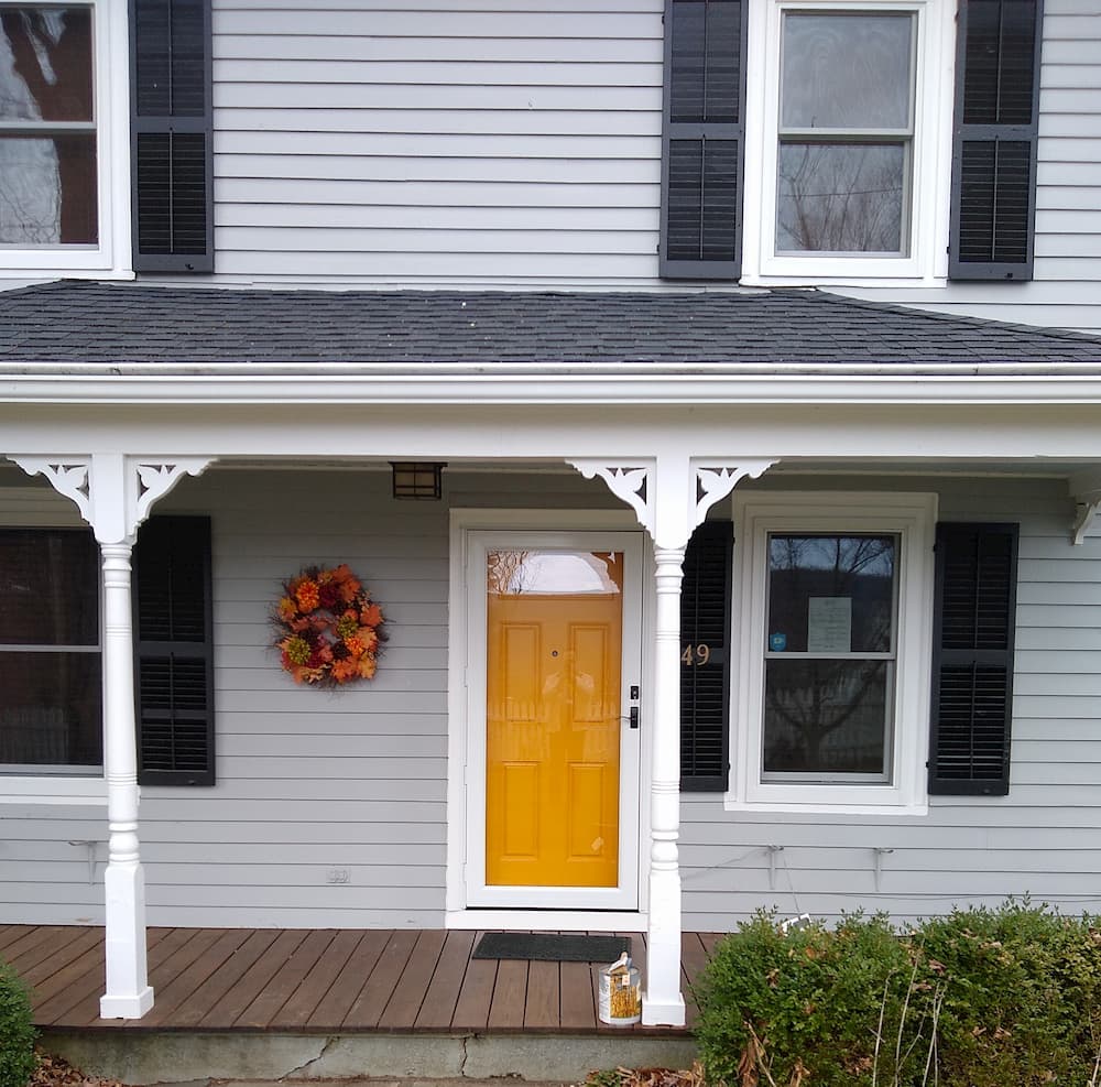 After photo of the front entry Pella door in a Lenox home