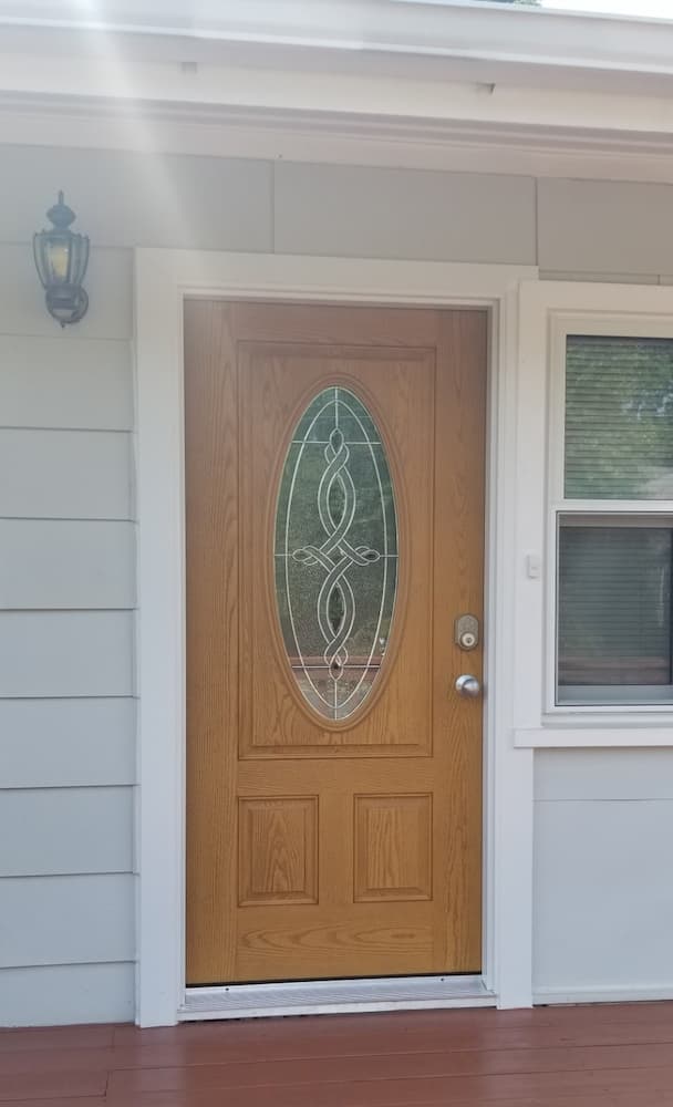 New wood-look fiberglass entry door