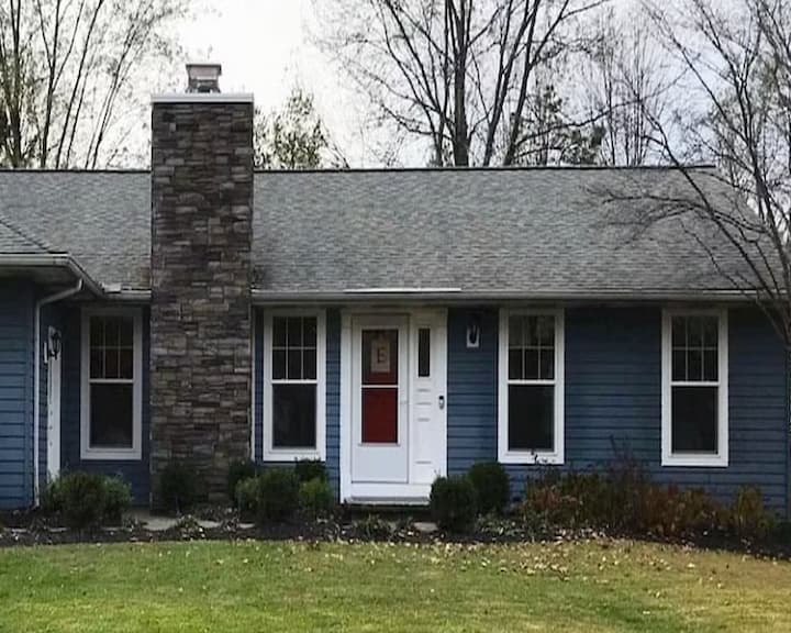 Front Of Home With White Replacement Windows