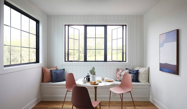 Combination of three ENERGY STAR windows with black frames and square grilles in breakfast nook
