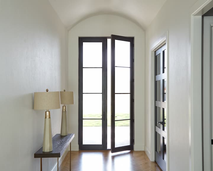 Pella's Contemporary French hinged double front door with glass