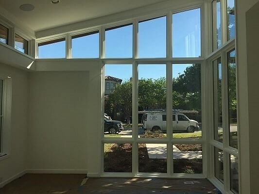 Floor to ceiling windows with white trim