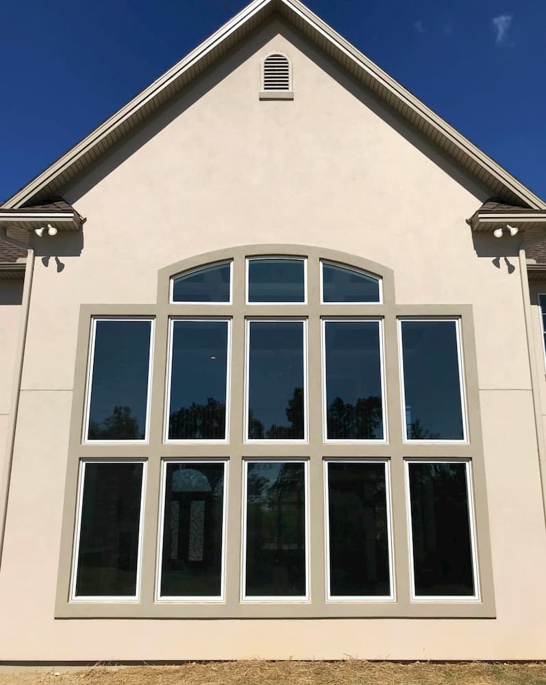 Exterior view of fixed and casement wood windows