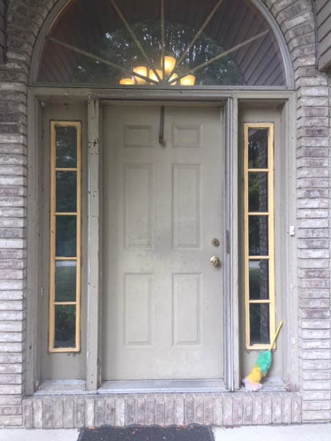 Old worn-down gray entry door