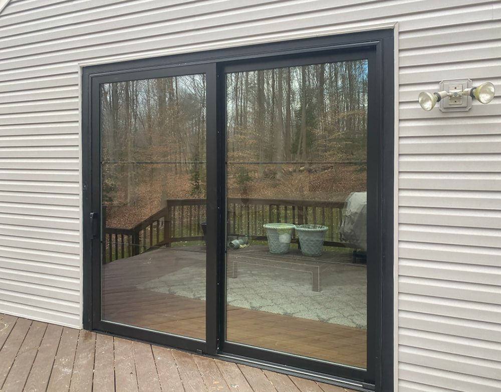 New fiberglass sliding patio doors on Charlottesville, VA, home exterior
