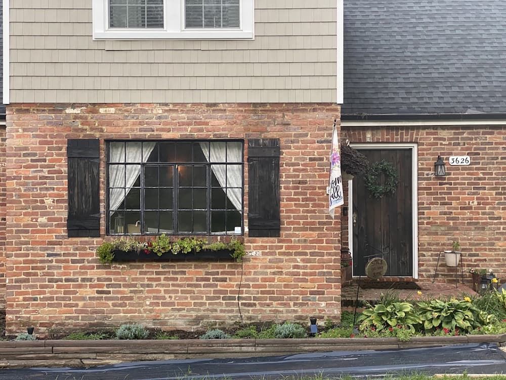 Brick exterior of Richmond home before installing new fiberglass casement windows
