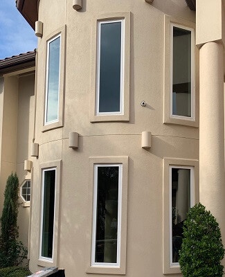 exterior image of kosari home with new vinyl windows