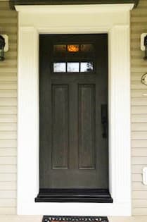 New wood-look Craftsman-style fiberglass entry door