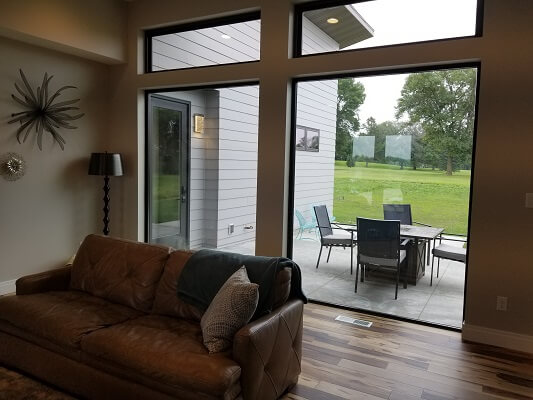 patio view of waterloo home with new fiberglass casement windows