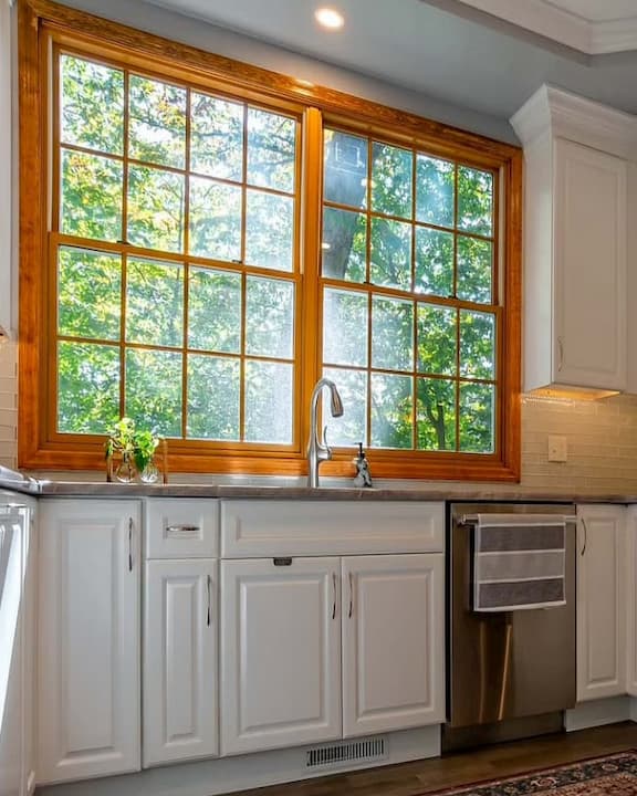 Wood double-hung windows in kitchen.