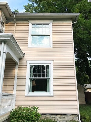 front view of camp hill home with new wood double hung windows
