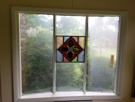 before image of huntingdon home with new vinyl sliding windows