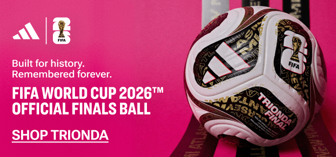 Promotional image of the FIFA World Cup 2026 Official Final TRIONDA Match Ball, shown on a gradient pink background with overlaid adidas and FIFA World Cup 2026 logos with overlaid text.