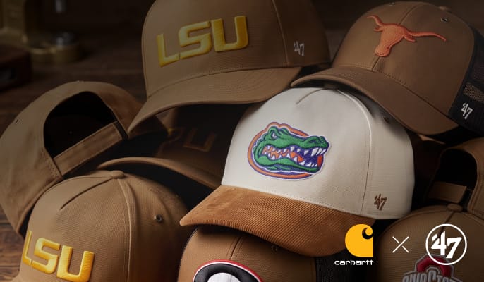Assorted Carhartt x 47 collegiate trucker hats featuring popular college team logos.