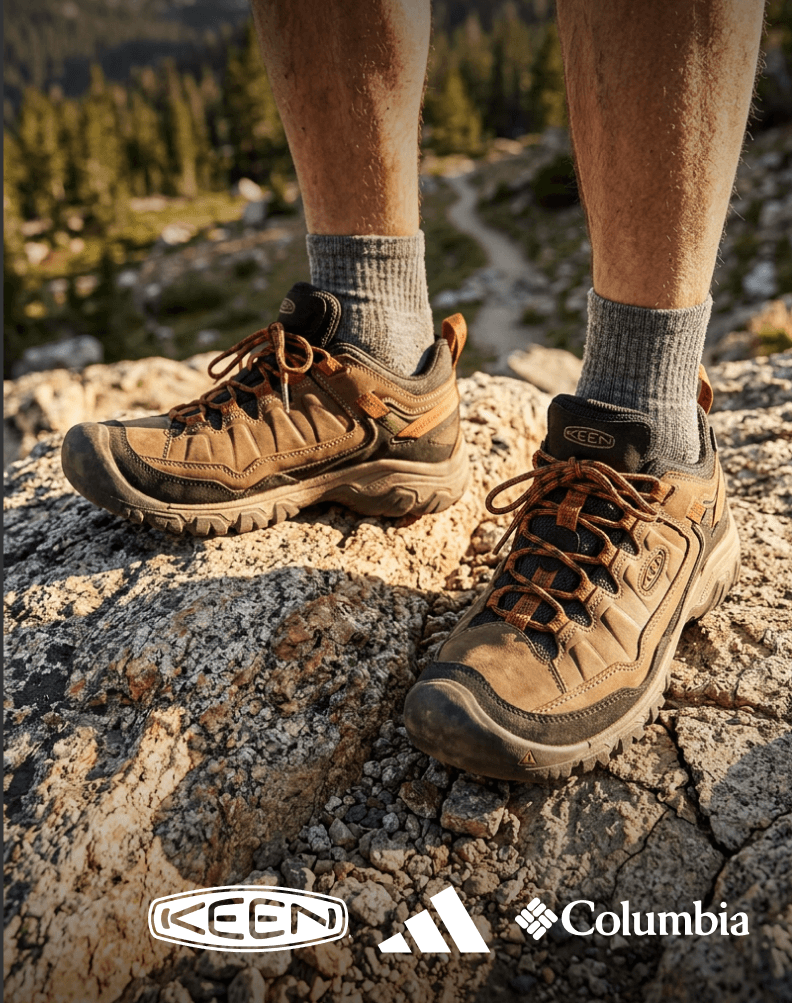 KEEN hiking shoes worn on a rocky trail featuring brand logos for KEEN, adidas, and Columbia.