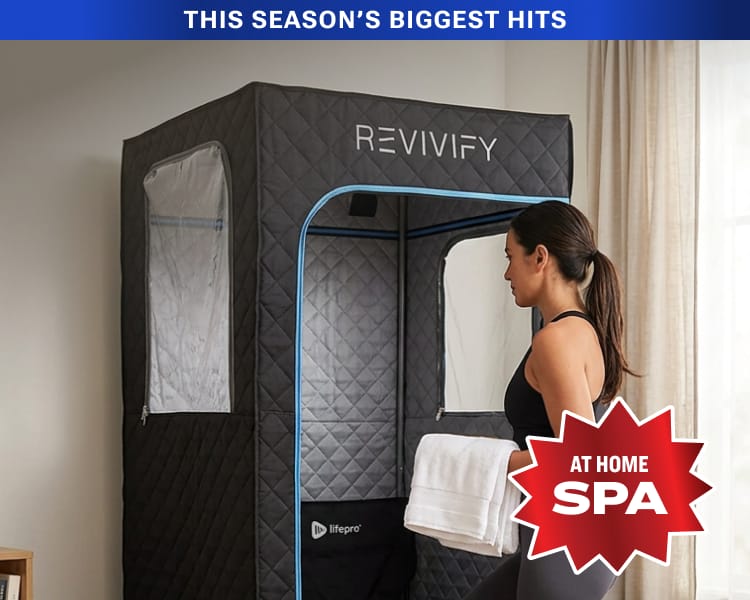 Portable personal steam room enclosure with person carrying a towel and overlaid badge "At Home Spa."